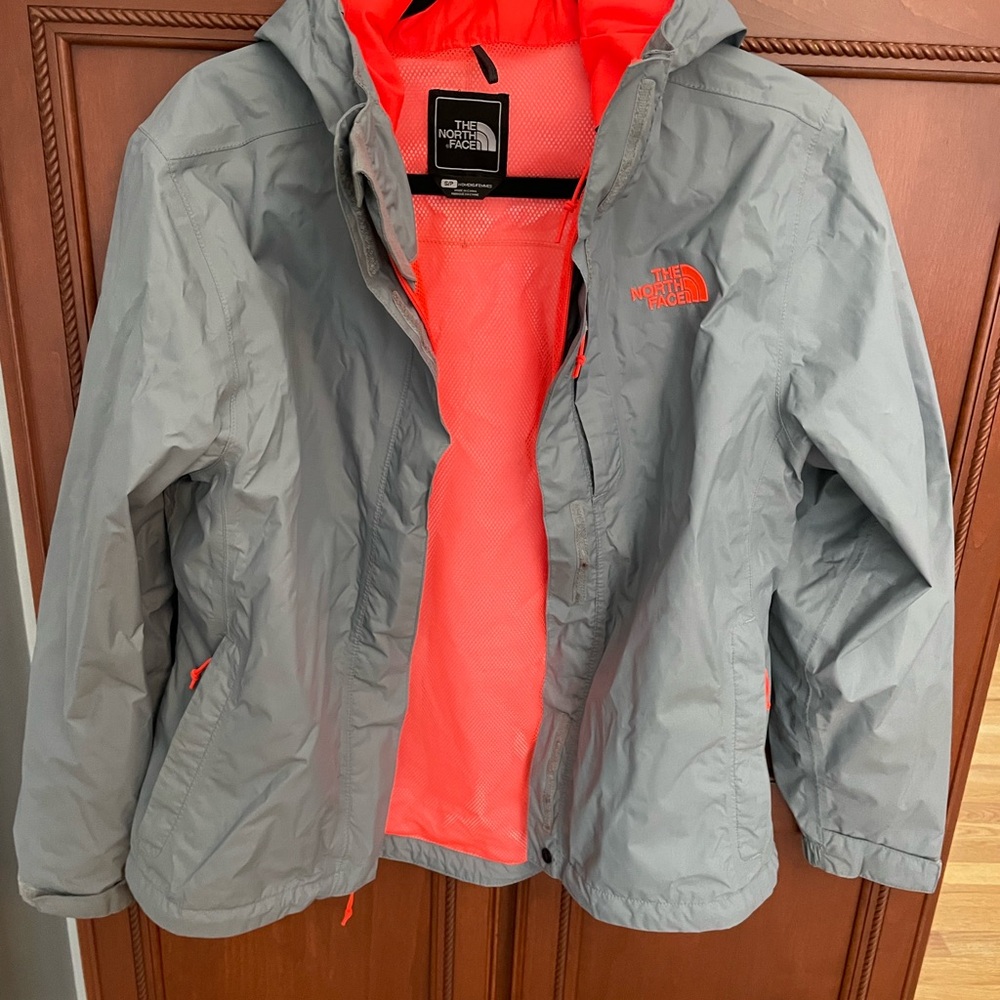 The North Face Women’s Gray Raincoat with Bright Orange Interior